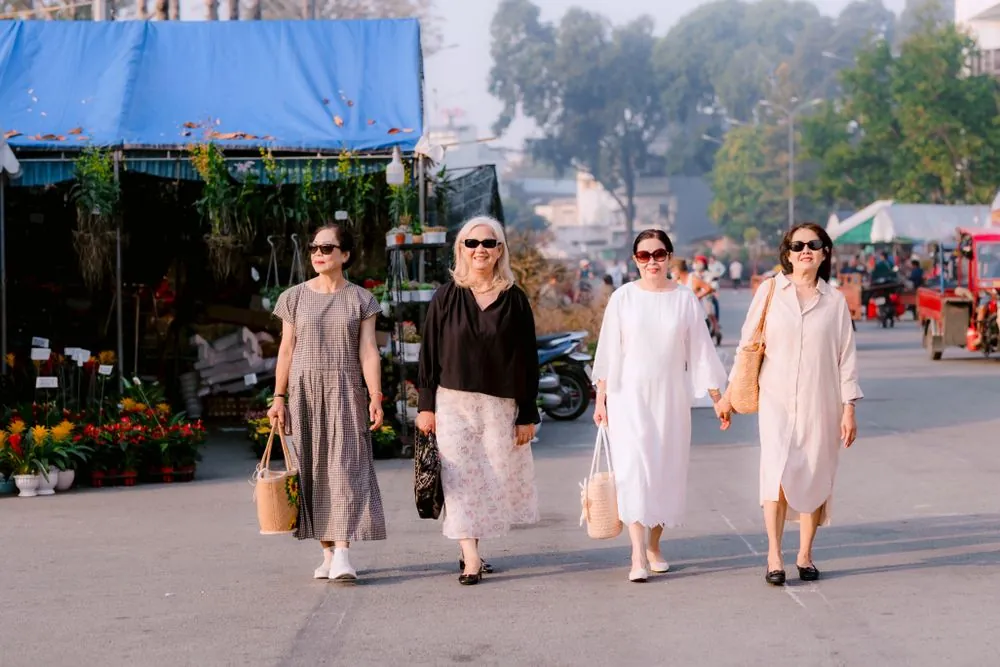 Three women of different ages walking together